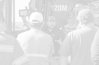 An EKCEP instructor explaining equipment to students