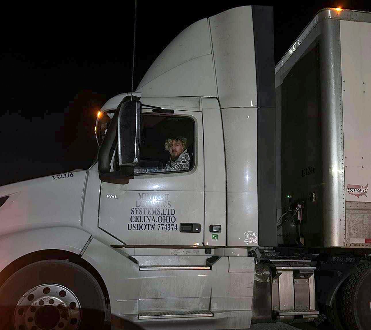 a person in a semi truck