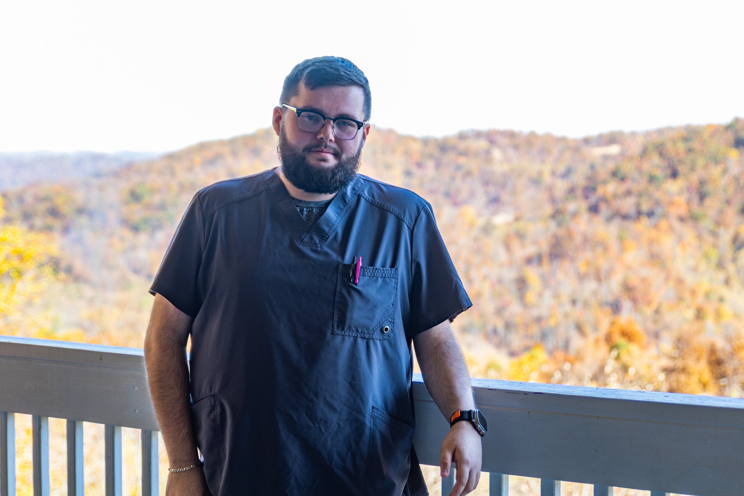 a person standing on a balcony
