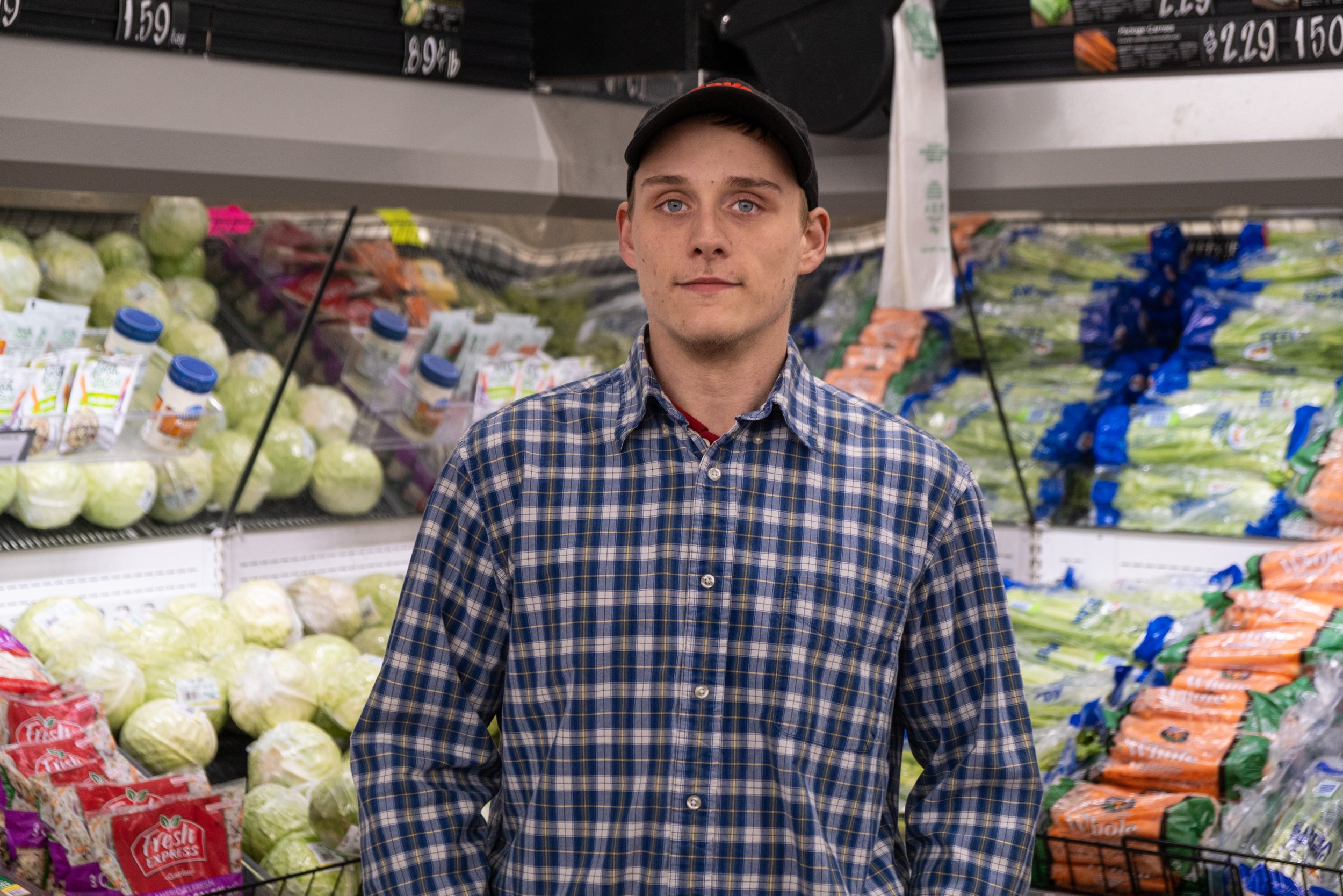 a person standing in a grocery store