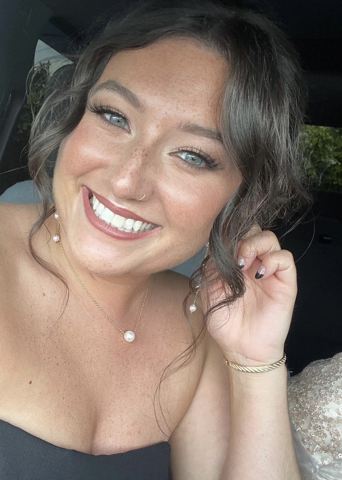 a person smiling at the camera