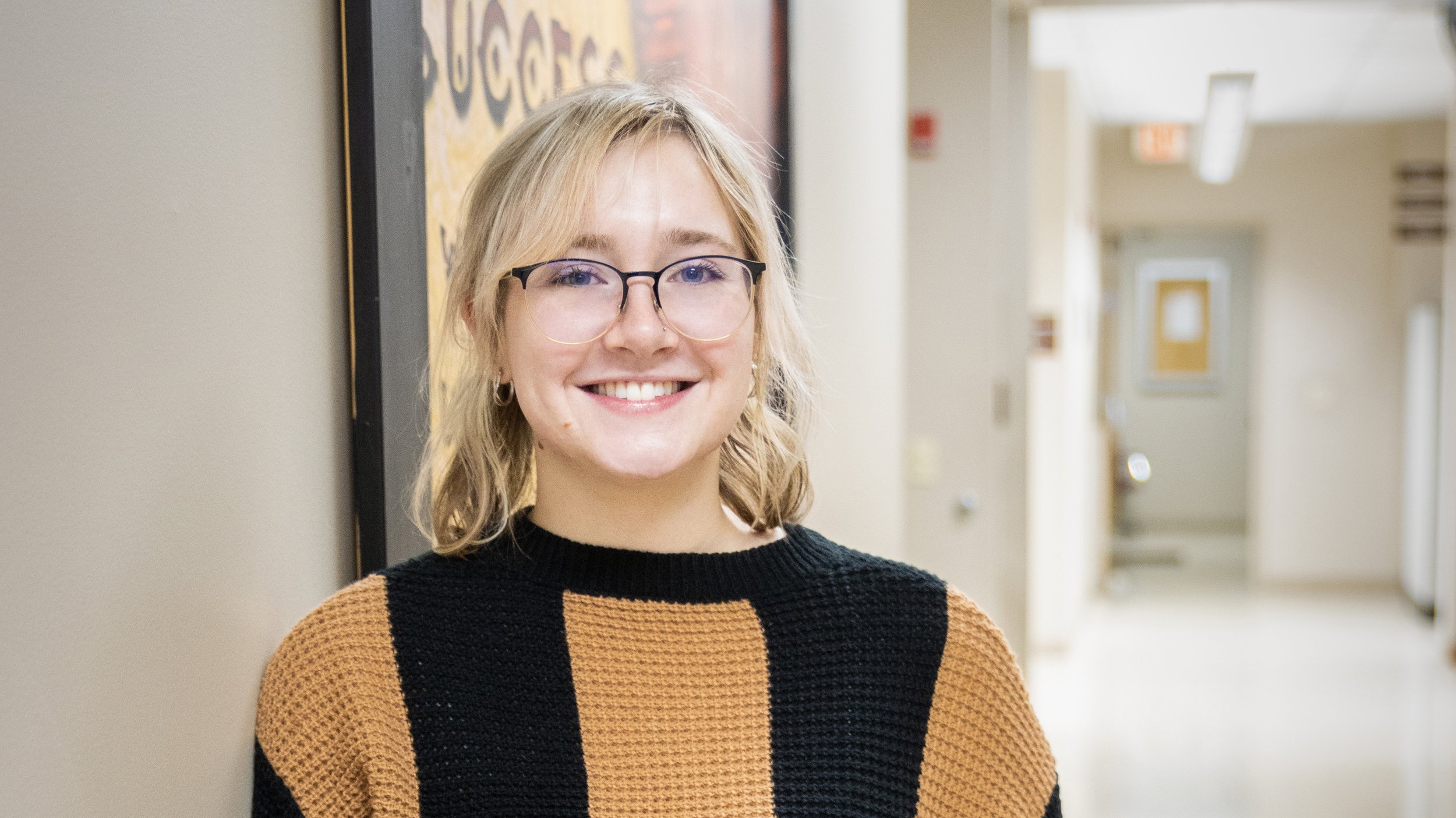 a person smiling at camera