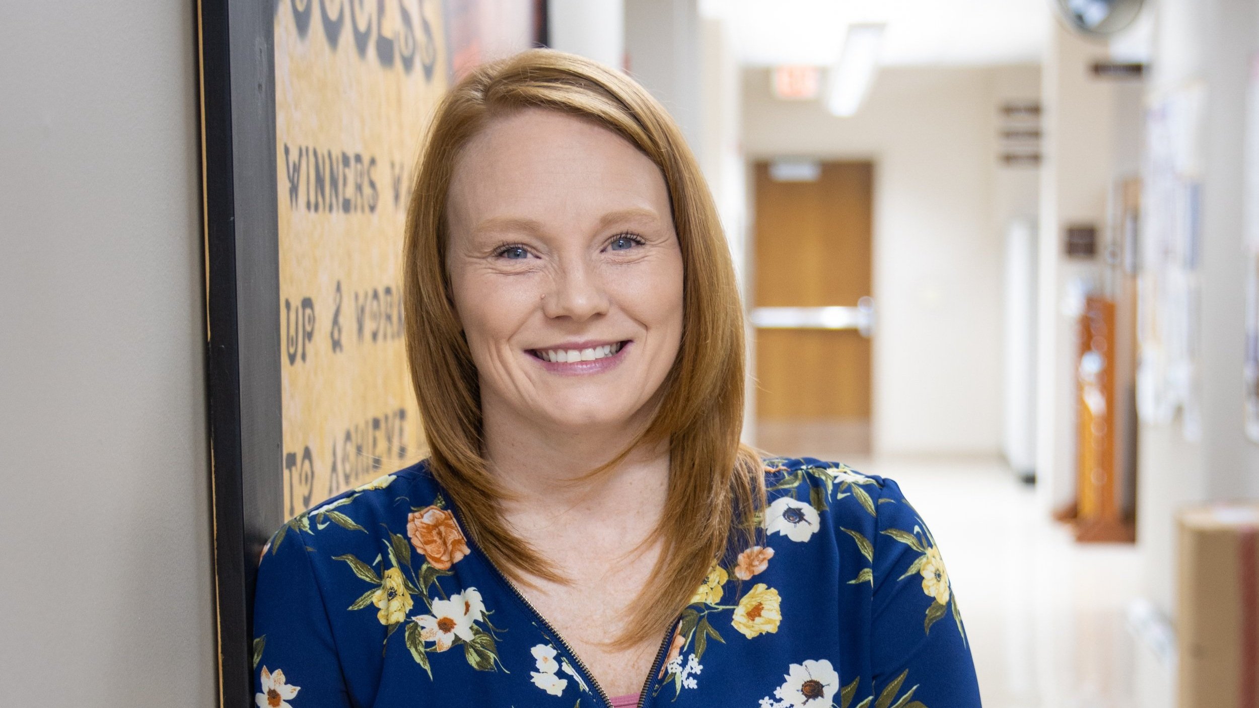 a person smiling at camera