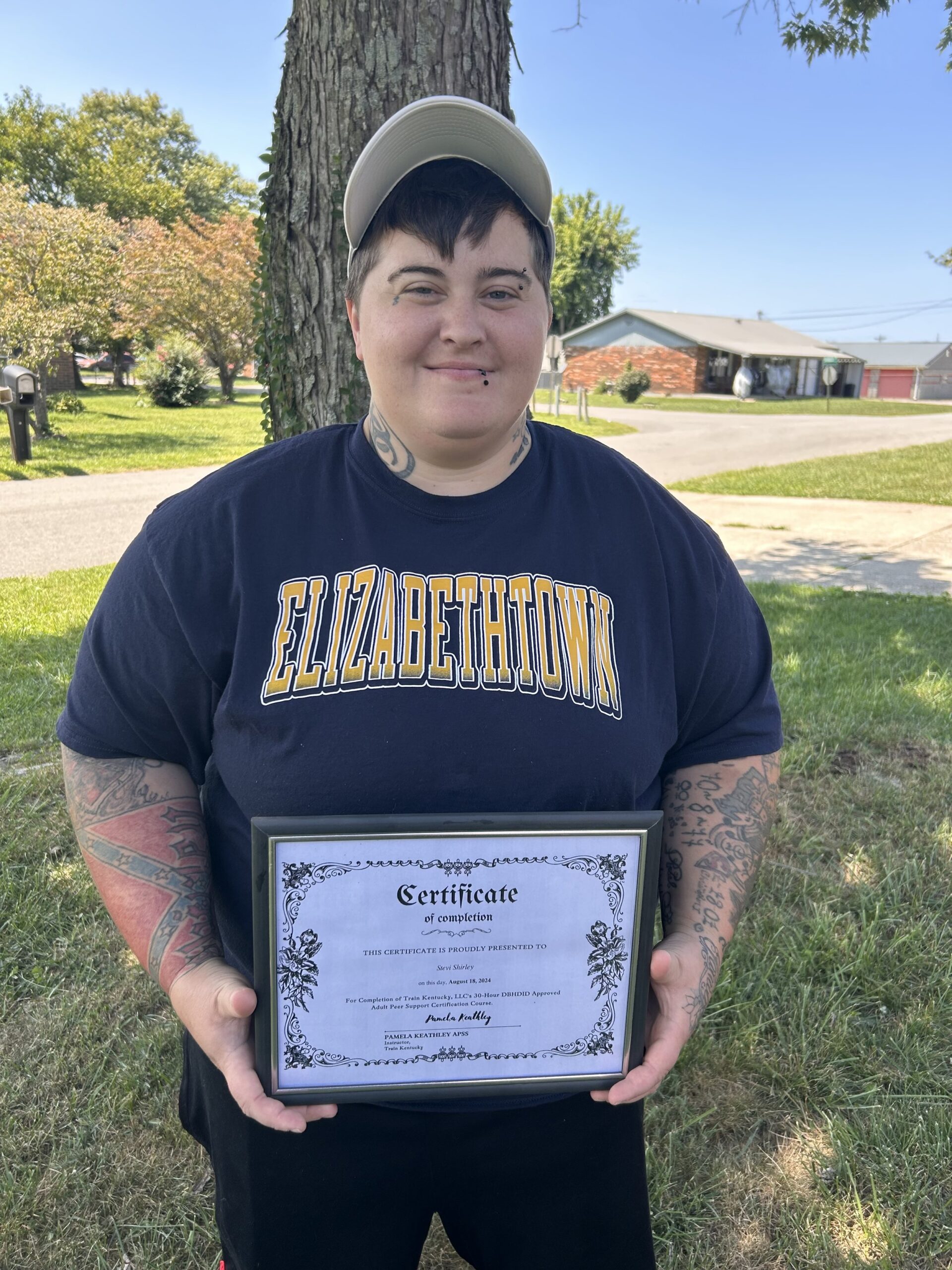 a person holding a certificate