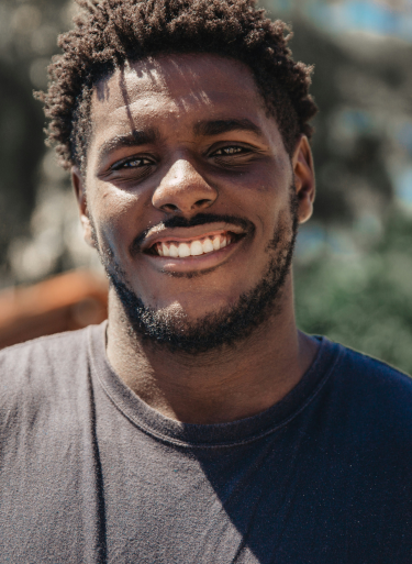 a person smiling for a picture
